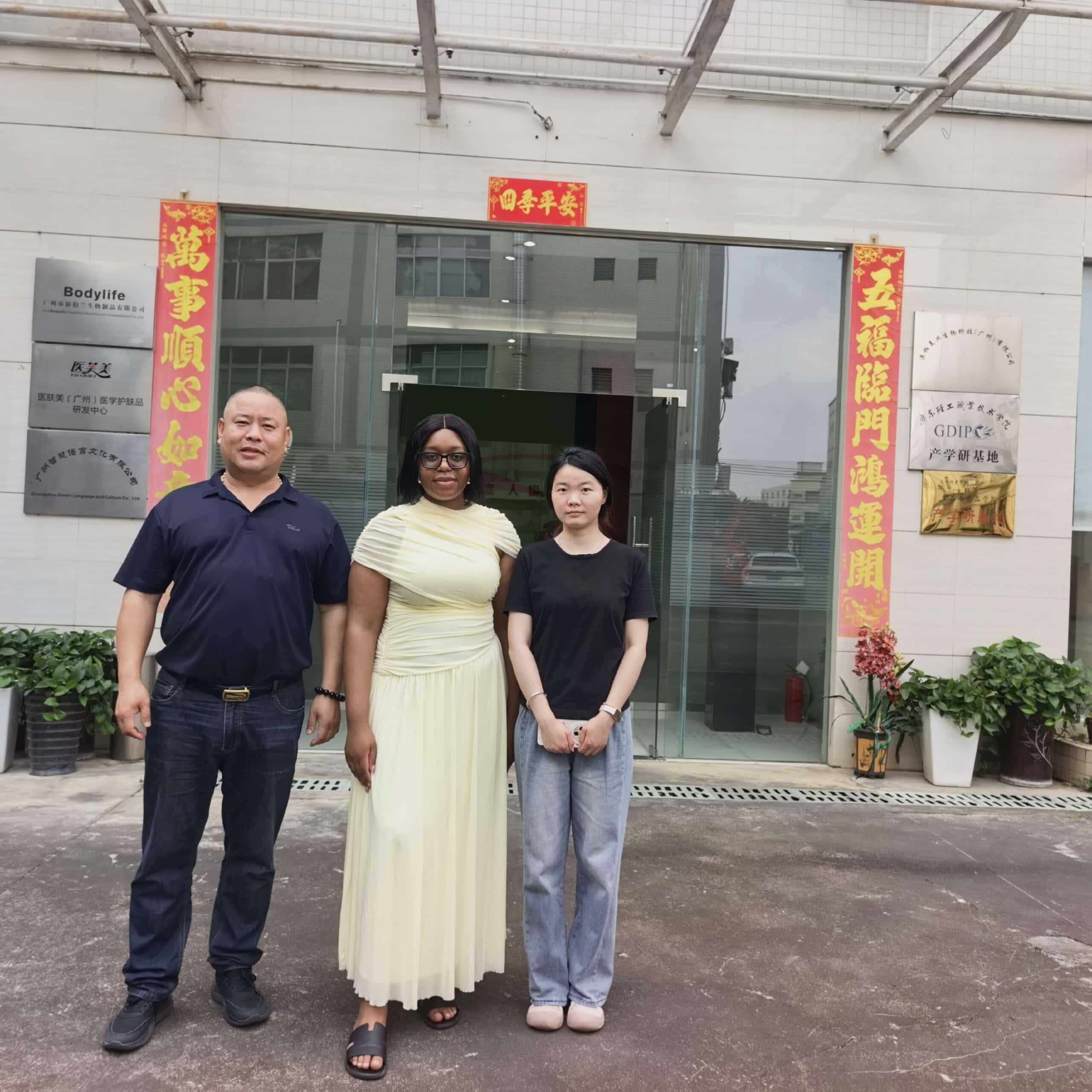 International visitors and the CrownDiaBio team outside the Guangzhou skincare facility
